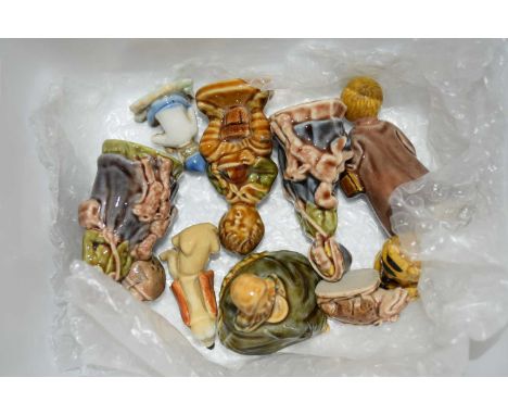 A box of various Wade whimsies