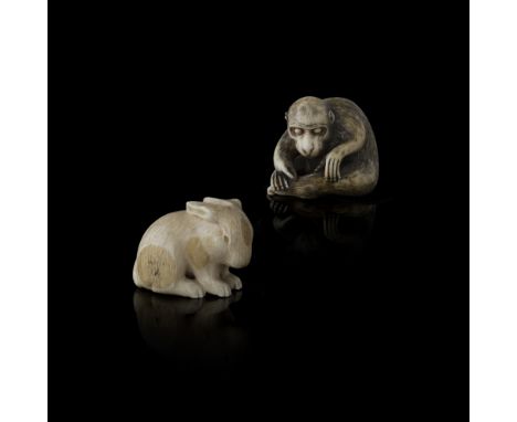 IVORY NETSUKE OF A MONKEYSIGNED GYOKUSHINSAI, MEIJI PERIOD seated leaning forward and appearing to be picking louse from its 