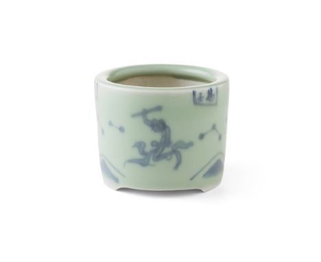 BLUE AND WHITE CELADON-GROUND 'KUI XING KICKING' CENSERthe cylindrical vessel raised on three short bracket feet, the exterio