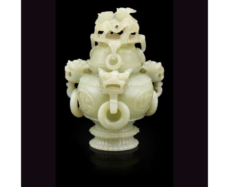 JADE VASE AND COVERthe vase of compressed globular form raised on a two-tiered pedestal, the shoulder applied with three drag