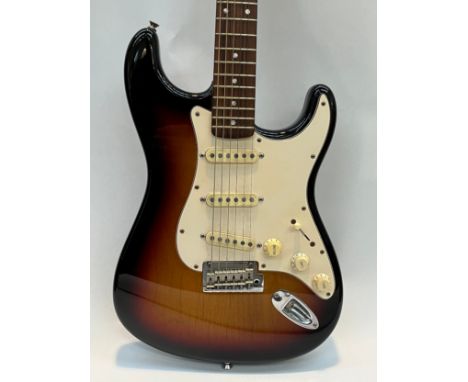 A Fender American Stratocaster electric guitar, approx 2004, sunburst body, white scratch plate, WD Licensed By Fender replac
