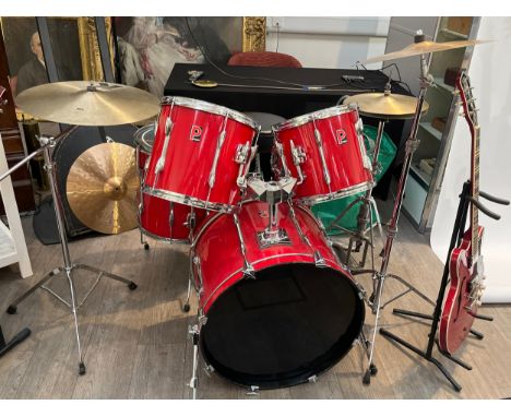A 1970's Premier five-piece drum kit in red comprising 14'' steel shell snare, 12'' and 13'' mounted toms and 16’' floor tom,