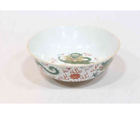 Chinese Kangxi large bowl decorated with circling dragons inside and out, Kangxi mark to base, 26cm dia.