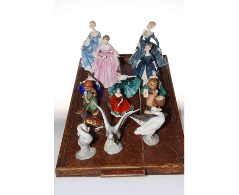 Eight Royal Doulton figures including four by Peggy Davies, two Hummel figures, two Royal Crown Derby paperweights and three 