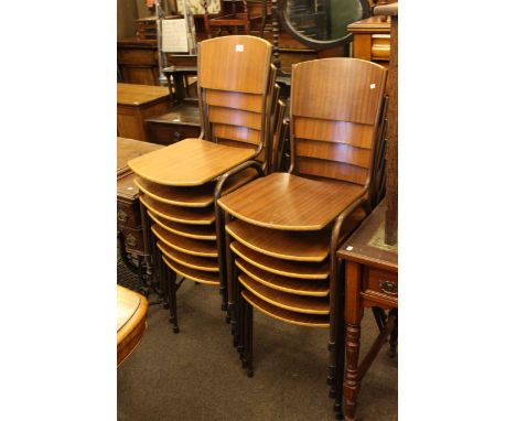 Set of thirteen vintage stacking chairs.