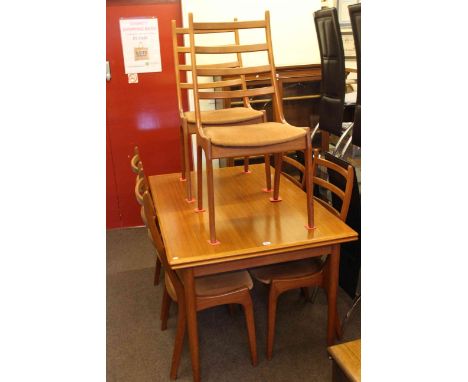 1970's teak draw leaf dining table and six ladder back chairs.