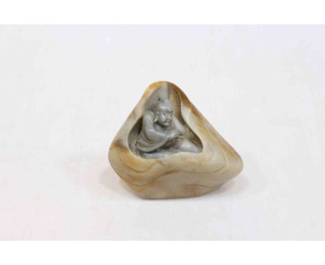 Jade carving of a Buddha.