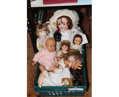 Good assortment of antique and vintage bisque dolls.