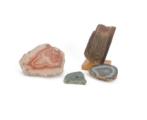 Polished slice of tiger eye, together with geode of pink agate, slice of blue gate and nephrite slice