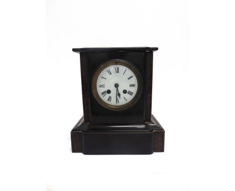 A SLATE MANTEL CLOCK  late 19th century, the 9.5cm diameter white enamel dial with black Roman numerals, the two-train moveme