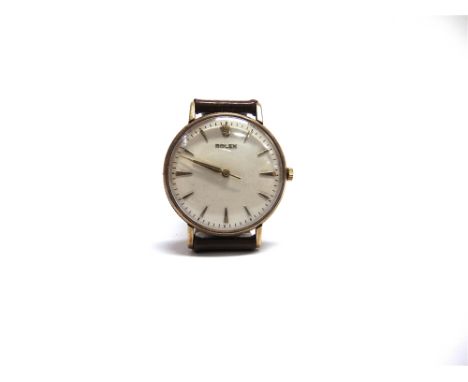 ROLEX, A GENTLEMAN'S 9 CARAT GOLD MECHANICAL WRISTWATCH with unusual milled 'coin edge' case and lugs, the white dial with gi