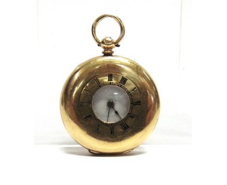 A HALF HUNTER STYLE FOB WATCH  stamped '18K', the white enamel dial with black Roman numerals and hands, the four piece hinge