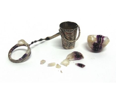 AN UNUSUAL BLUE JOHN LADLE the stone bowl to a metal rim and twist handle, 10.5cm long A/F; with a late Victorian silver thim