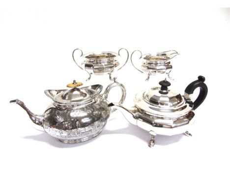 A THREE PIECE SILVER TEA SERVICE  by Docker & Bunn Ltd, Birmingham 1922, of round panelled form on four supports, 1154g (37.2