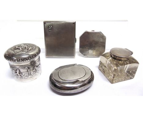 A SILVER TOBACCO BOX  a silver cigarette case; a powder compact; and embossed Indian box; and a glass inkwell with metal cove