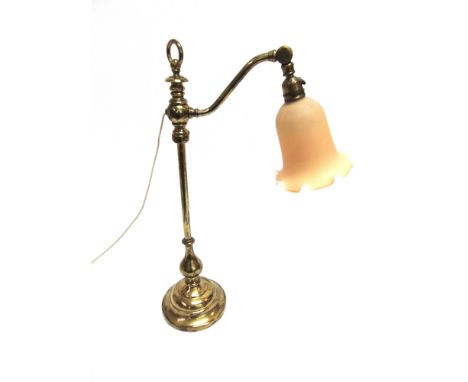 A LARGE BRASS PULLMAN TYPE ADJUSTABLE TABLE LAMP  with glass shade, 60cm high