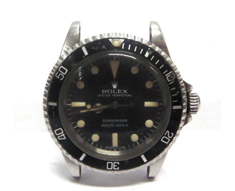 ROLEX, OYSTER PERPETUAL, SUBMARINER  stainless steel wristwatch on a bracelet, the black dial with luminous dots, batons and 