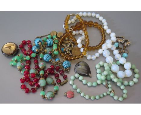 A Graduated Jadeite Bead Necklace (42.4g) and costume jewellery including micro mosaic necklace