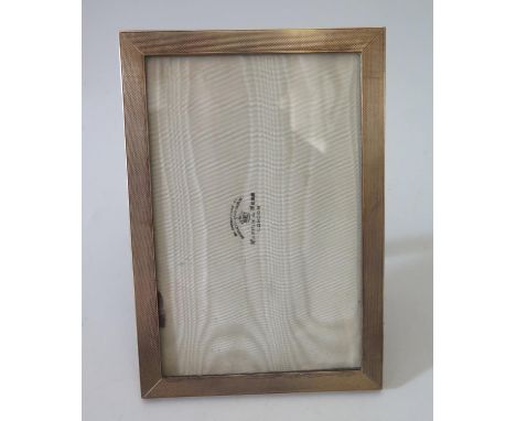 A George VI Silver Photograph Frame with engine turned decoration, 7.5 x 5", London 1937, Mappin & Webb 