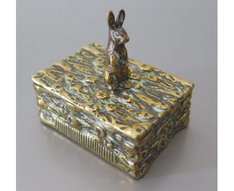 A Brass Vesta with hinged top and rabbit finial, 19th century, 5 x 3.5cm base 