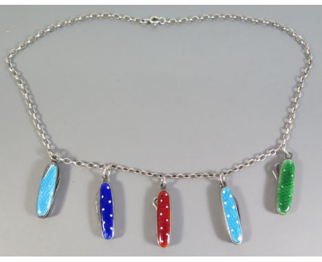 A Silver Necklace decorated with five miniature enamel folding knives and button hooks 