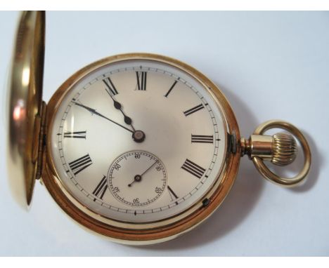 An 18ct Gold Half Hunter Keyless Pocket Watch with blue enamel chapter ring, the 41mm enamel dial with subsidiary seconds dia