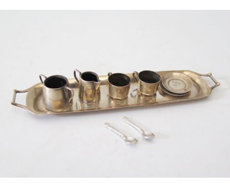 An Edward VII Silver Dolls' House Tray, sugar, creamer and two cups with saucers, Birmingham 1905, Cornelius Desormeaux Saund
