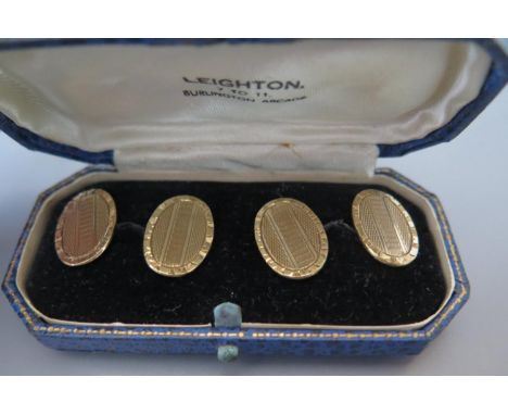 A Pair of 9ct Gold Cufflinks with engine turned decoration, 7.2g 