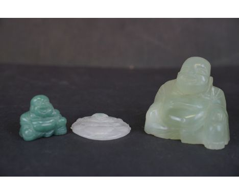 Two carved Jade Buddha figures together with a carved Jade Buddha amulet. 