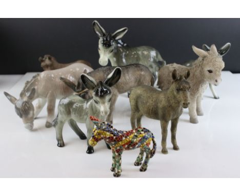 Collection of Nine Ceramic and Resin Donkeys 
