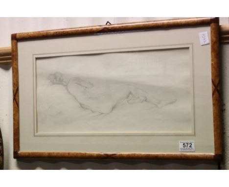 A framed and glazed pencil drawing sketch of a recumbent nude women unsigned 20 x 43 cm. 