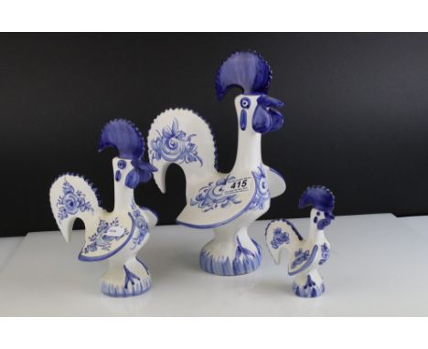 A set of three Portuguese ceramic blue and white chickens. 