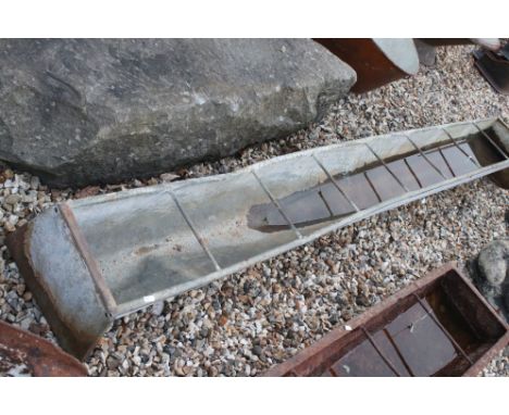 A vintage galvanised free standing water / food trough, measures approx 244cm 