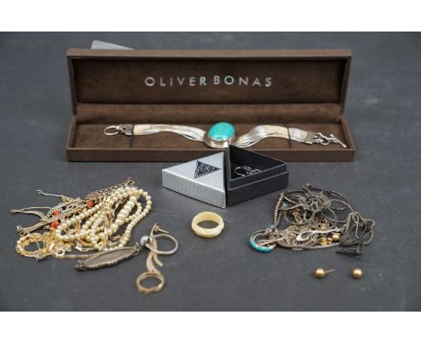 A collection of vintage and contemporary jewellery to include a sterling silver and turquoise bracelet and a 9ct gold bracele