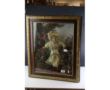 Clockwork Automaton Dancing Doll, dressed in silk clothes, mounted within a garden setting, marked to front ' Aspreys 1899 ' 