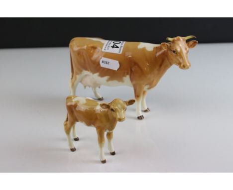 Beswick Guernsey Cow, first version, model 1248a together with a Beswick Guernsey Calf, model 1249a 