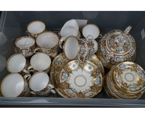 A vintage ceramic part tea / dinner service with gold leaf decoration. 