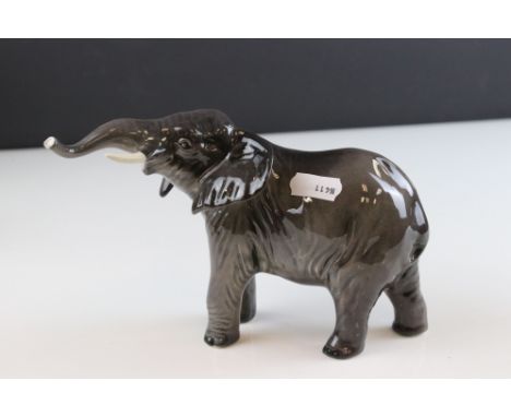 Beswick Small Elephant, trunk stretching, model 974 