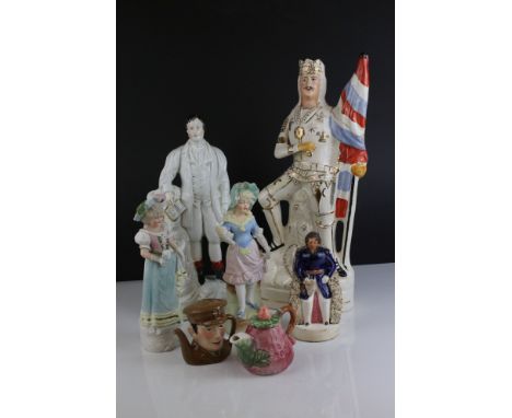 A group of mixed ceramic figures to include two Staffordshire figures, together with two novelty teapots 
