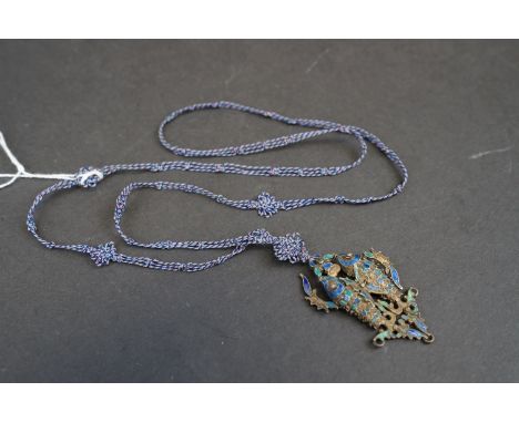 A vintage Chinese white metal and enamel double fish pendant on hand knotted silk chain. 