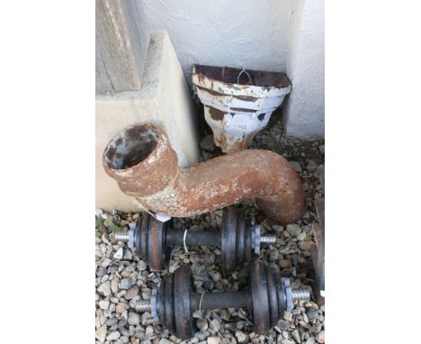Cast iron items - an Edwardian rain water hopper, a swan neck soil vent pipe &amp; a pair of dumbells (8.5kg per hand) 