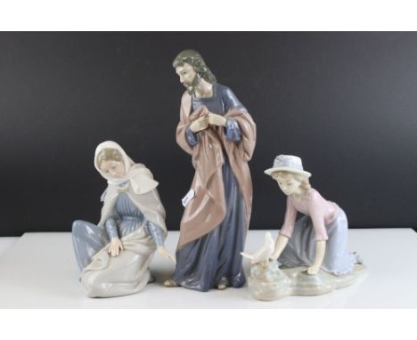 Three Nao Figures including Saint Joseph 0306, Virgin Mary 0307 and another of Girl on her hands and knees looking at a Dove 