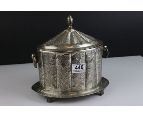 A white metal Turkish biscuit caddy. 