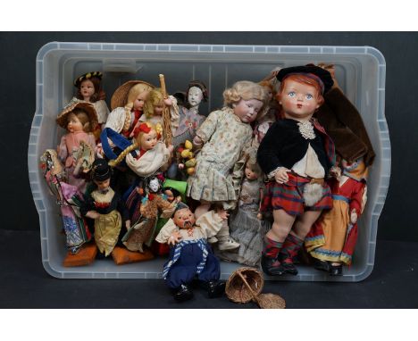 A collection of vintage dolls to include ceramic examples. 