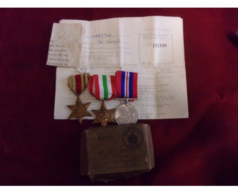 British WWII Medal Trio to: 14259743 Pte. K. Worrall. The Africa Star, The Italy and 1938-45 Medal in box of receipt, and his