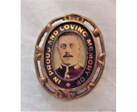 British WWI Sweetheart Memorial Brooch, a gilt body, writing “In Proud and Loving Memory of” around a picture of a Royal Fusi
