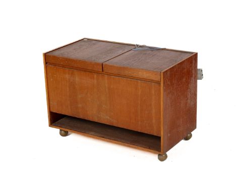 A mid-century teak cased radiogram. Having a Garrard turntable and Quad radio. H61cm x W91cm x D47cm