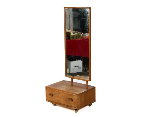 A circa 1960s Ercol 'Windsor' light elm cheval mirror with deep drawer base. Raised on casters.With Ercol sticker verso.  H15