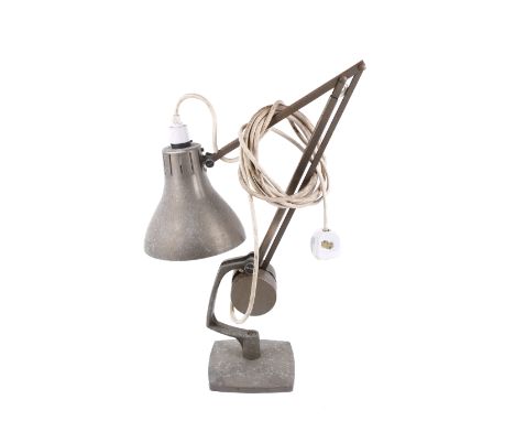 A mid century Horstman multi poise industrial desk lamp. Counter balance weight raised on a square base. 