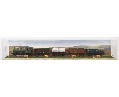 An 00 Gauge GWR Goods Train  Diorama containing Pannier Tank and four wagons in a Perspex Display Case, including static mode